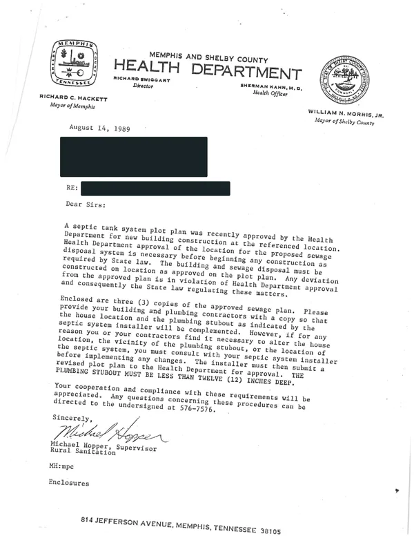 Nearly full page of an actual county septic approval letter with identifying details redacted